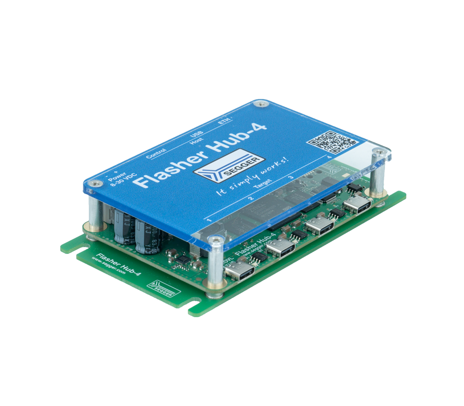 Flasher Hub-4 A blue electronic device labeled "Flasher Hub-4" sits atop a green circuit board. It features various ports, buttons, and a display, indicating its function in programming or device connectivity. The tagline "It simply works!" is also visible on the top.